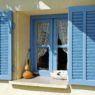 Opened blue window shutters