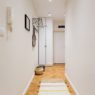 Entrance corridor with white closet